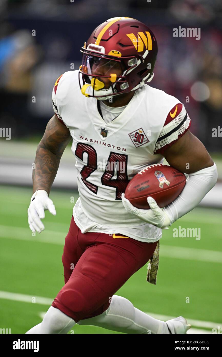 Washington Commanders running back Antonio Gibson (24) returns a