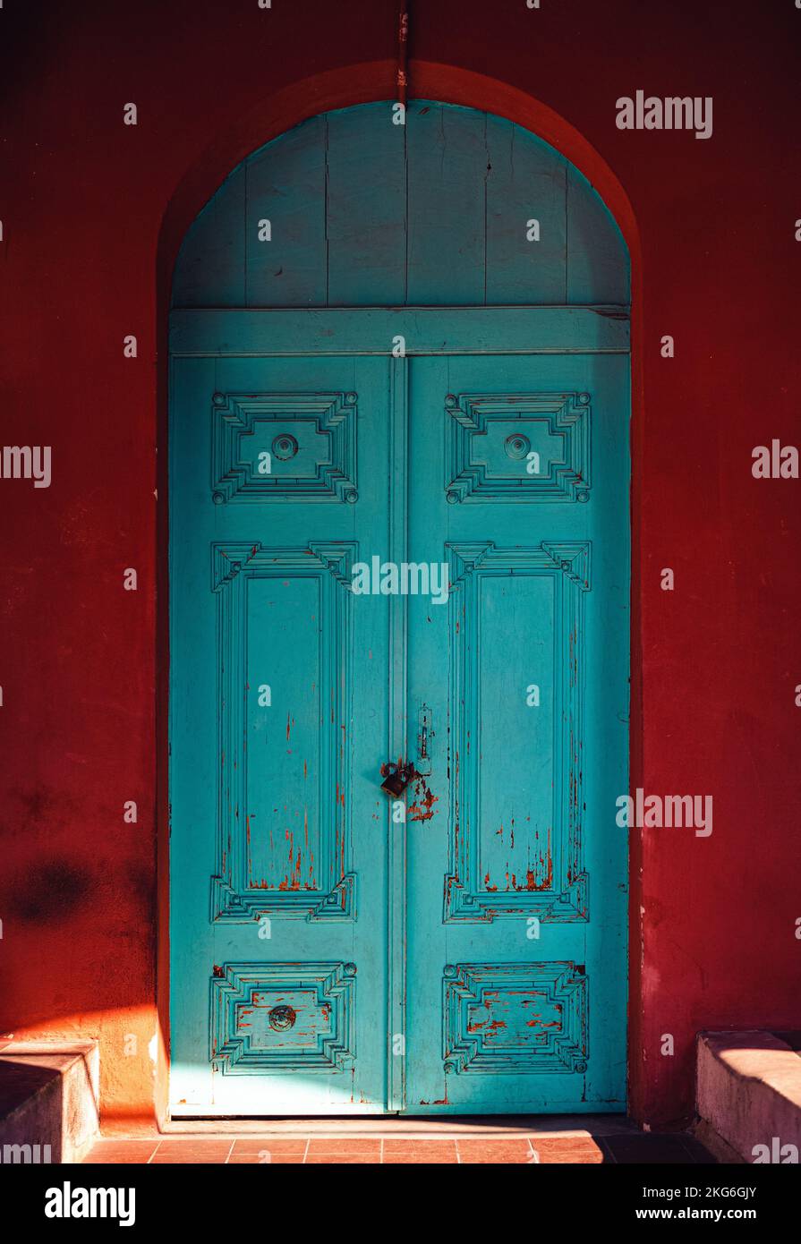 An old blue door with arch Stock Photo - Alamy