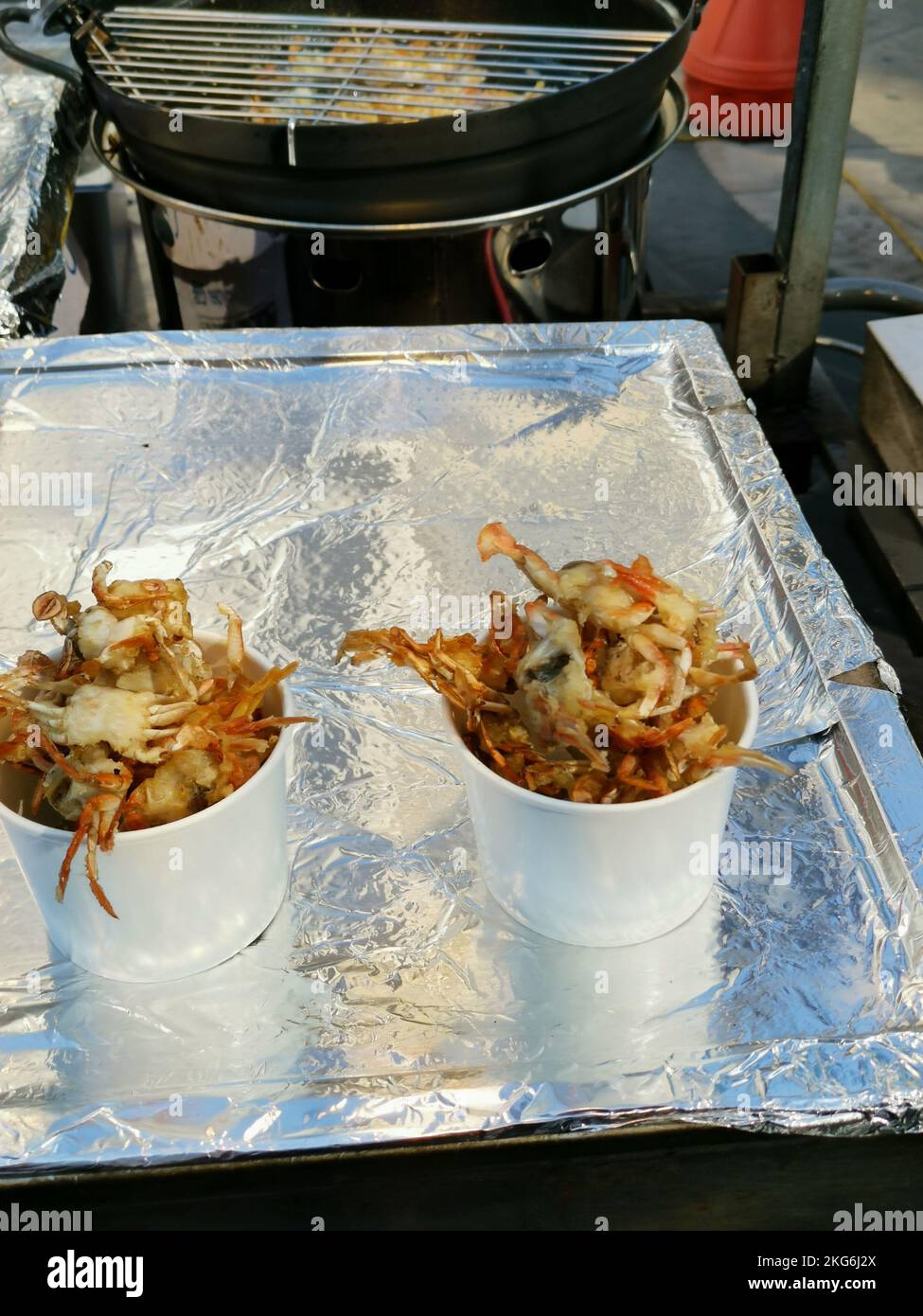 Small deep fried crabs on display in local fish market South Korea