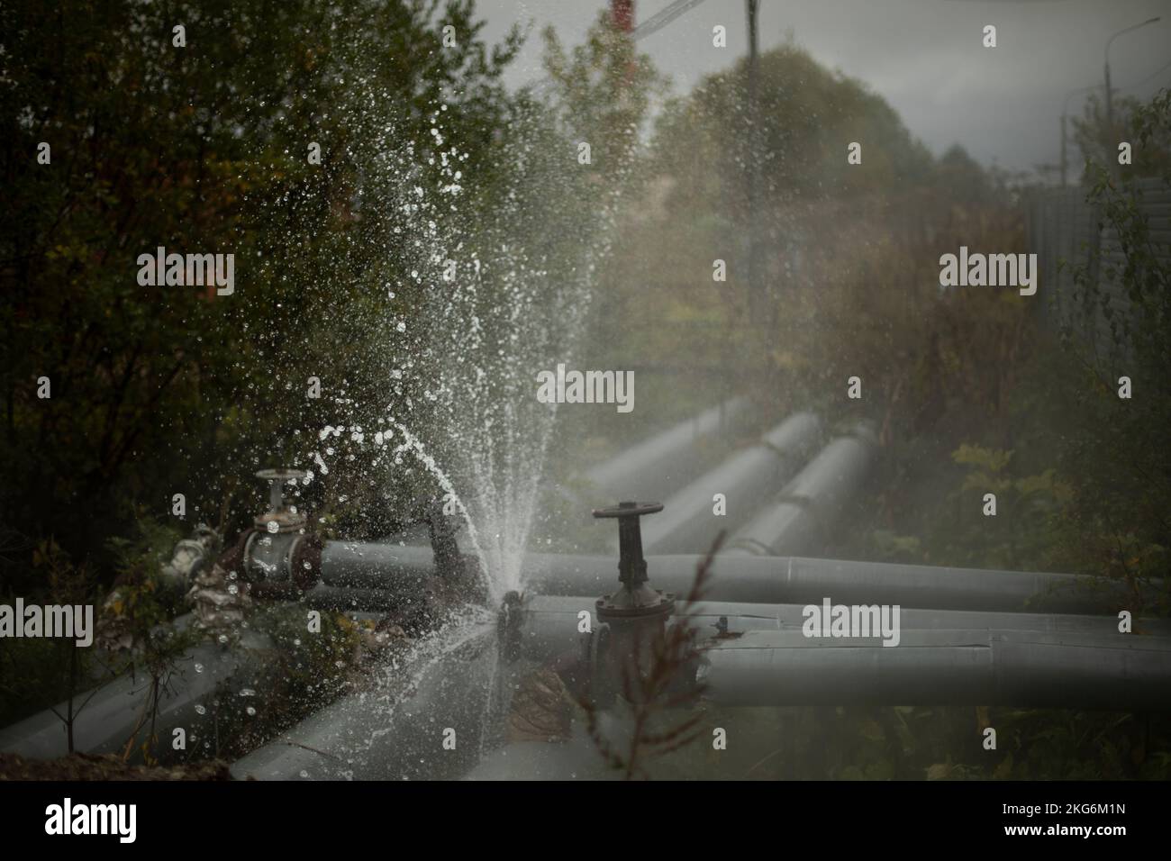 Burst pipe. Water pouring. Pipeline accident. It's dangerous situation