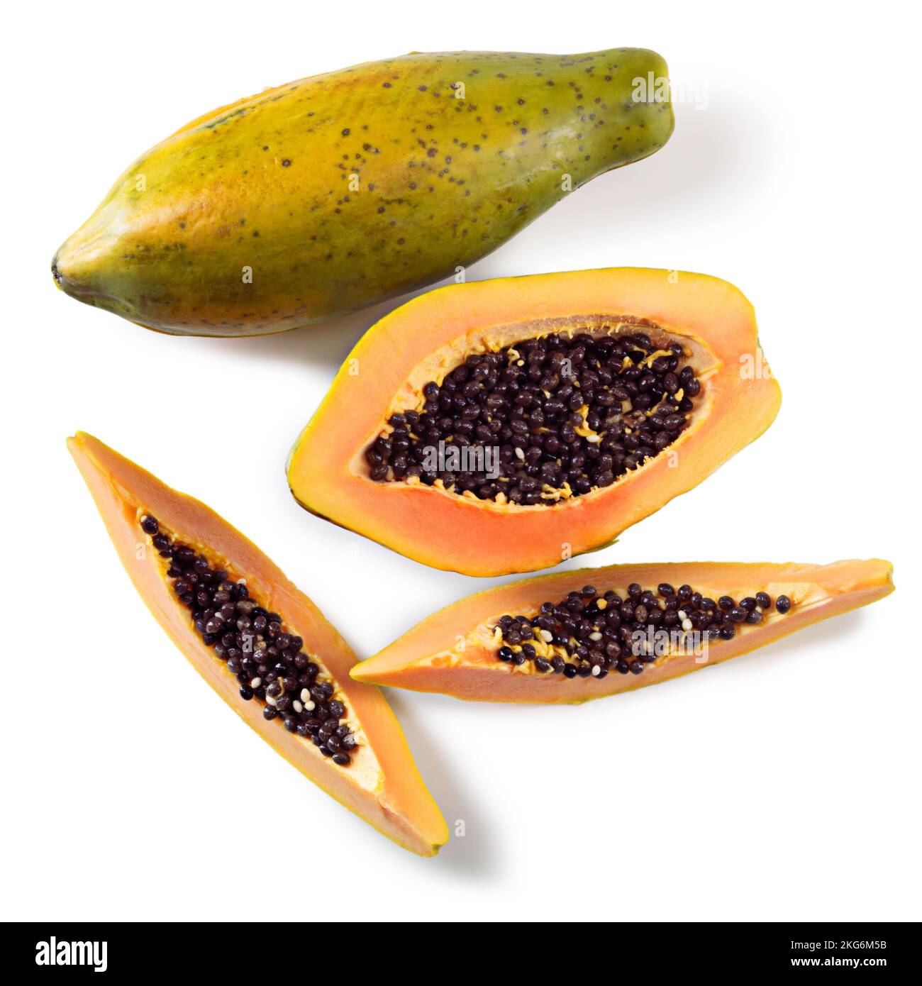 Papaya time. Studio shot of cut papaya fruit against a white background. Stock Photo