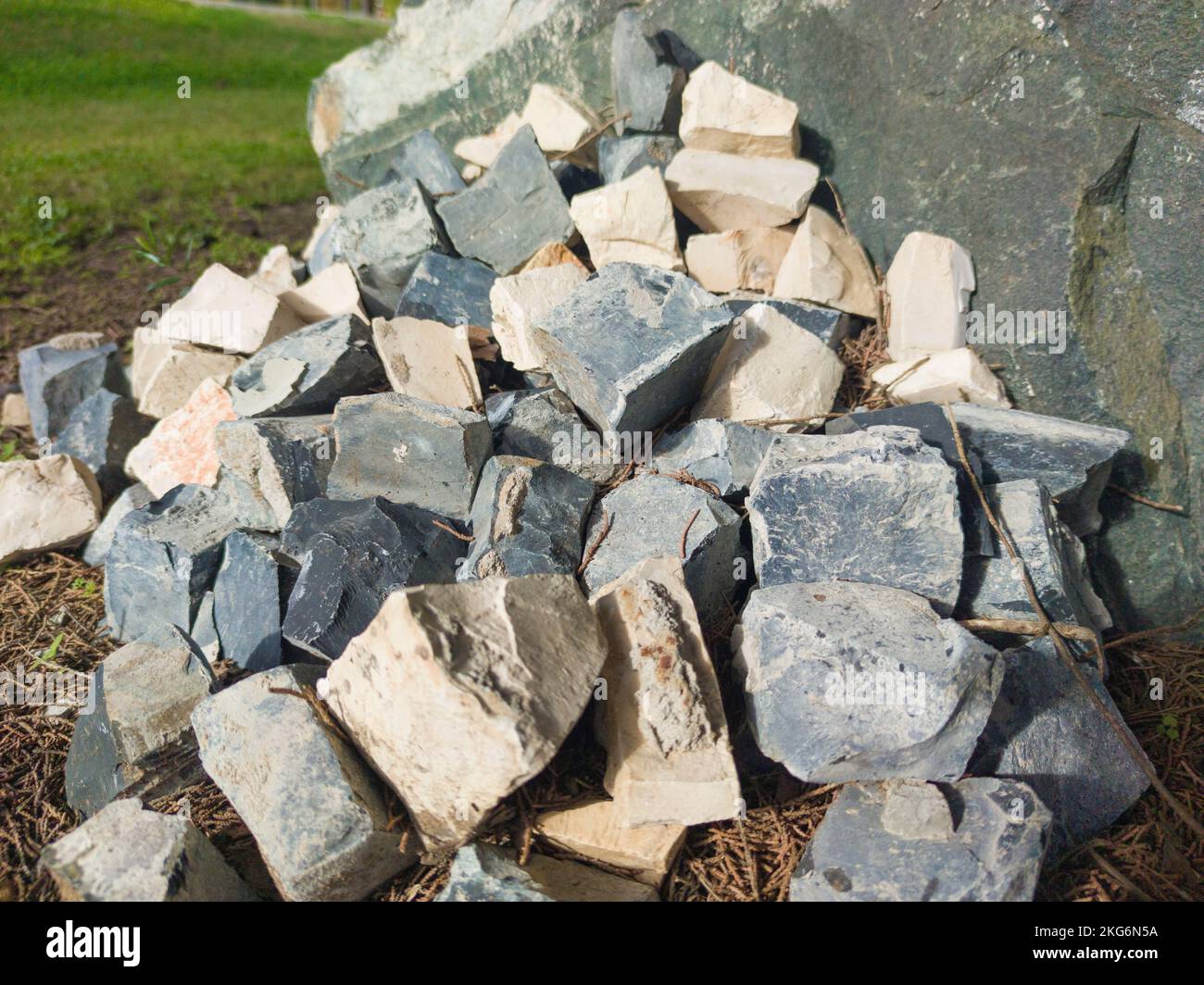 Traditional portuguese pavement. Pile of cobblestones Stock Photo