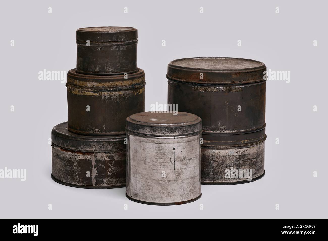 Old paint tins on white background Stock Photo Alamy