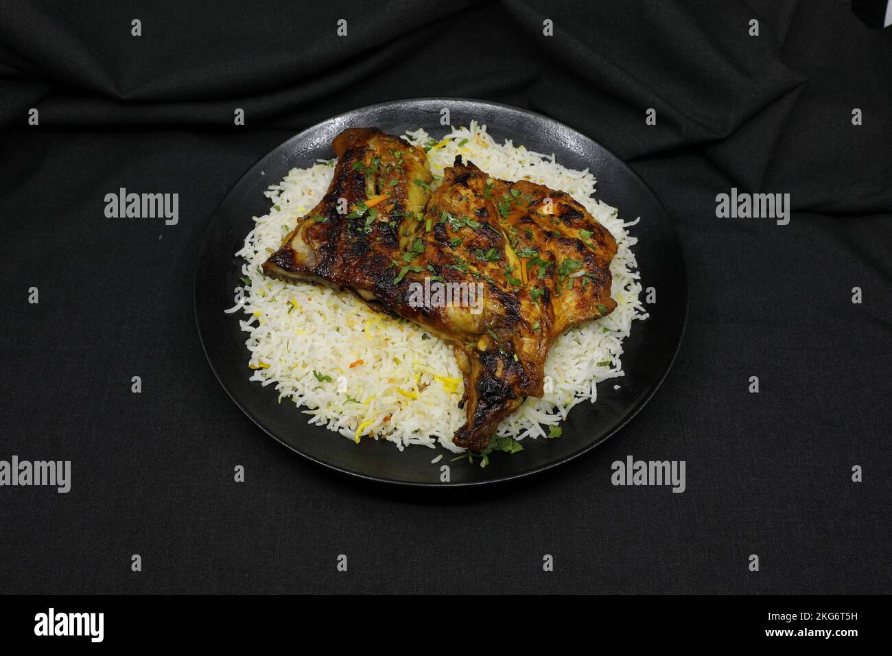Charcoal chicken with Ghee rice Stock Photo
