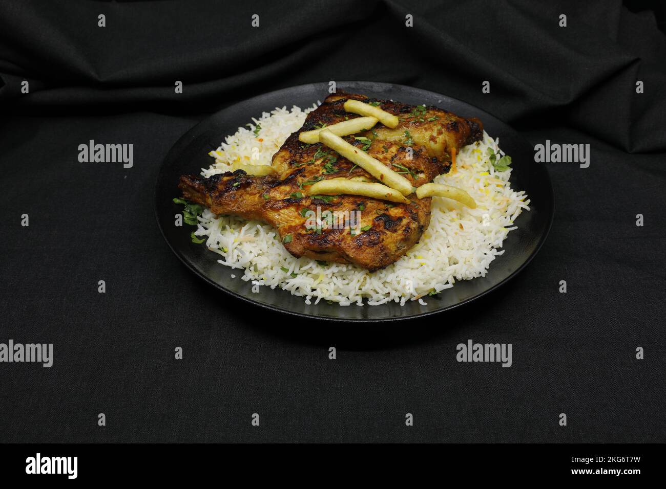 Charcoal chicken with Ghee rice Stock Photo