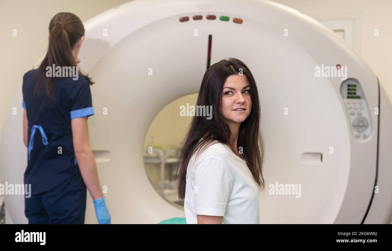 Radiologic technician and Patient being scanned and diagnosed on