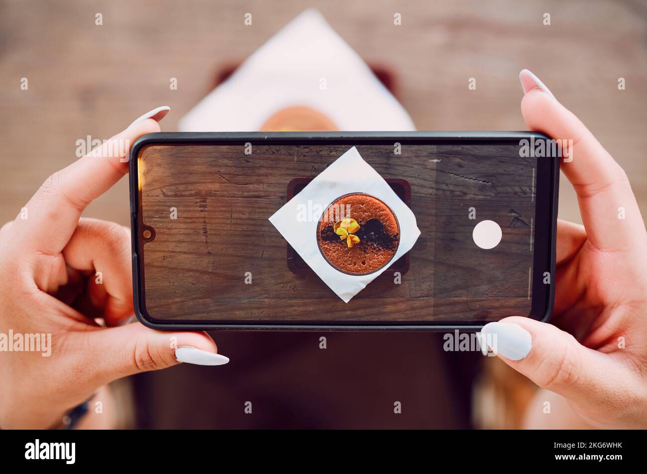 Smartphone photography, hands and coffee shop, cafe or restaurant for drink review on social media content marketing. Blog, ux and content creator Stock Photo