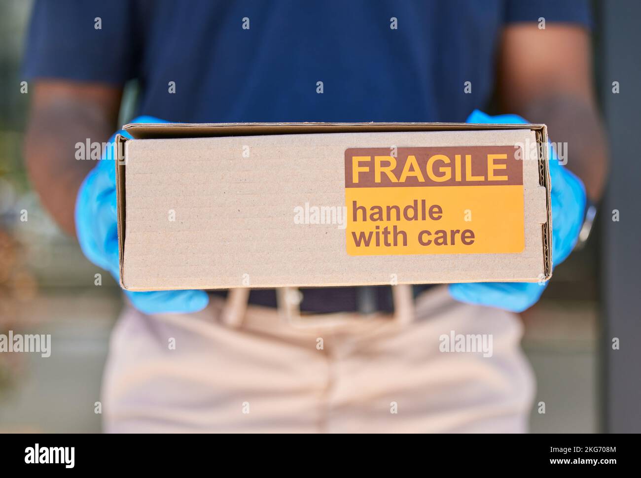 Courier, delivery and box with label for fragile goods, handle with