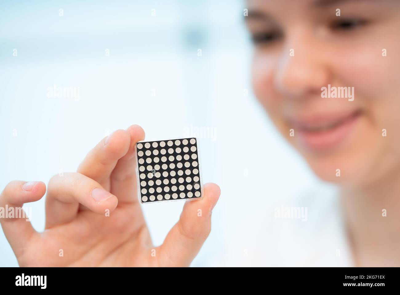 CPU crystal for using laptop and tablets in the hands of a young woman ...