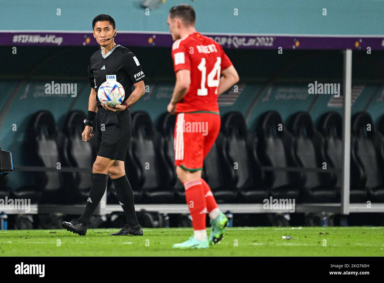 Chinese referee Ma Ning is serving as the fourth official in the 2022