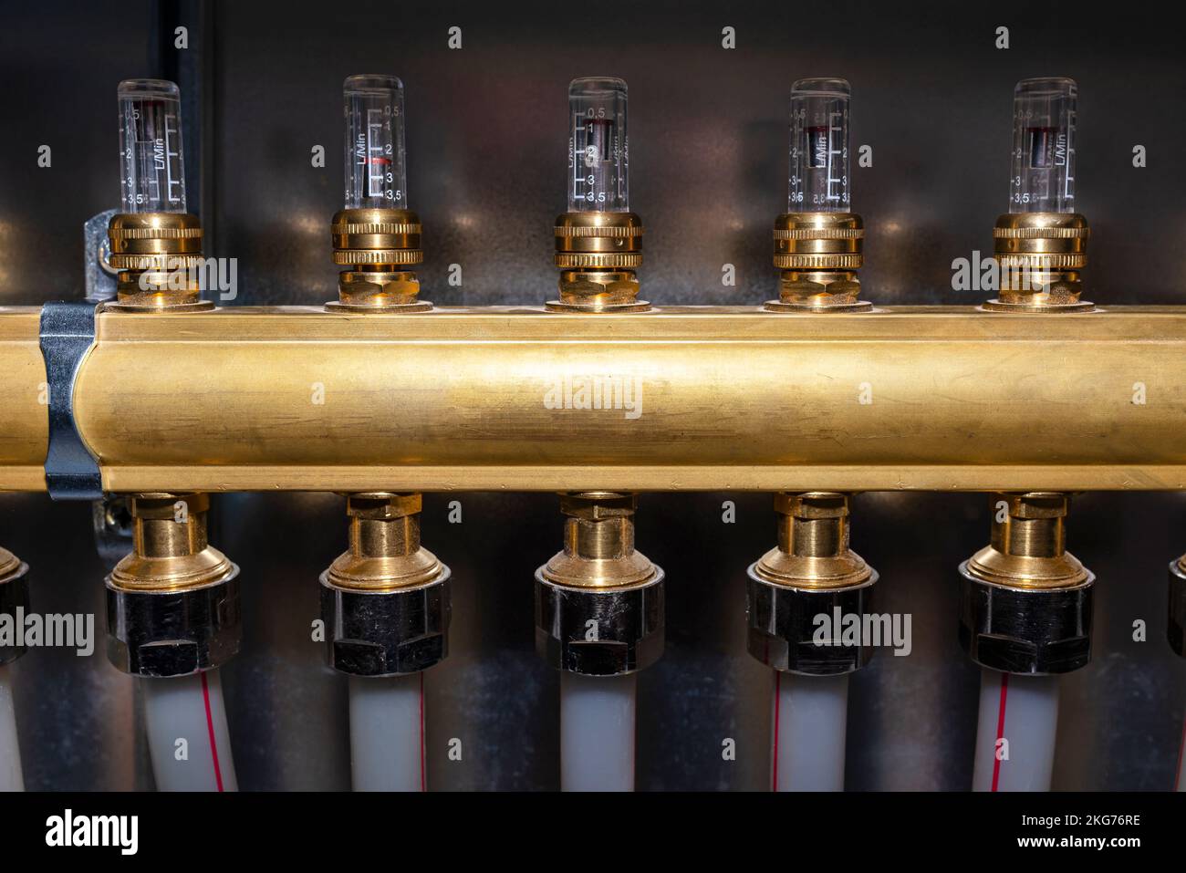 New brass manifold for underfloor heating systems with rotameters, seen up close Stock