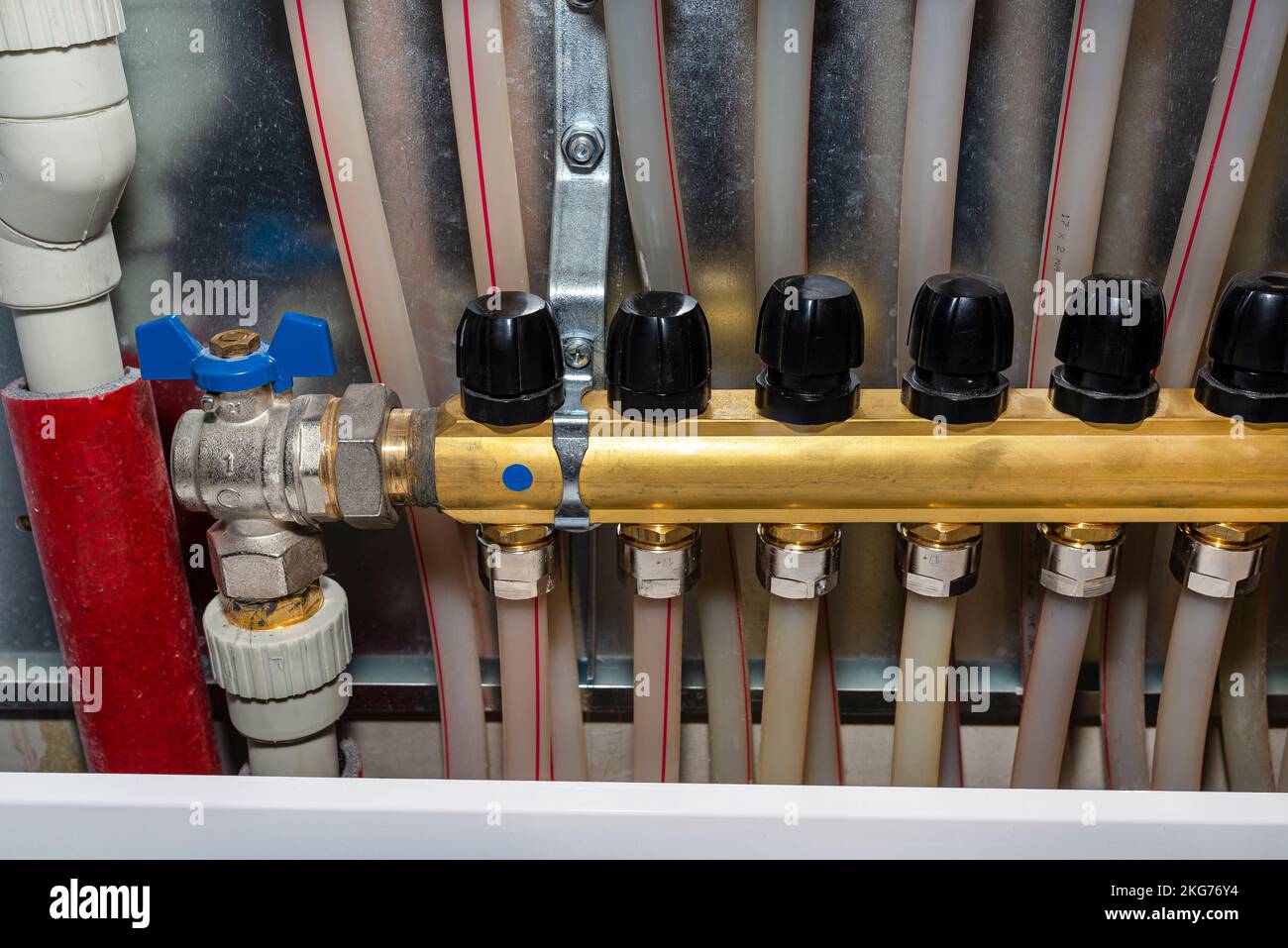 New brass manifold for underfloor heating with manual knobs to open the manifold valves Stock