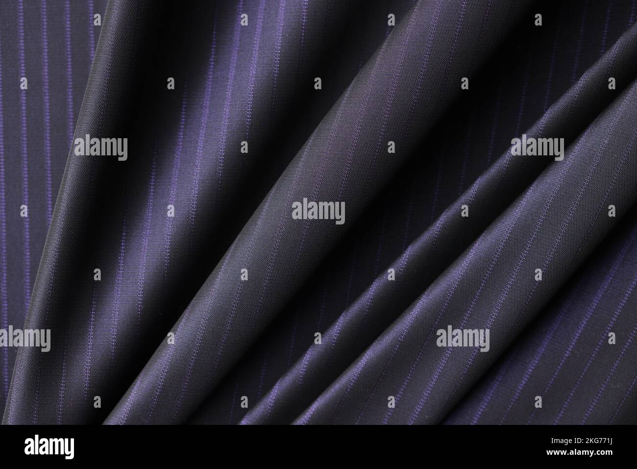 Black fabric with blue strips textured background for design art work
