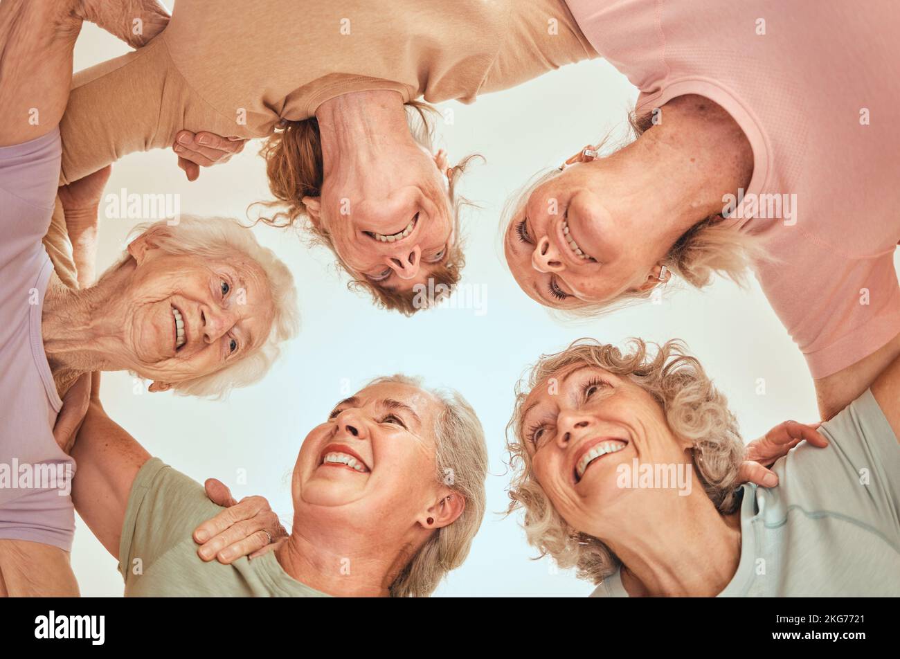 Fitness, goals and senior women in a circle for team building, motivation and community support. Retirement, below or happy elderly friends with Stock Photo