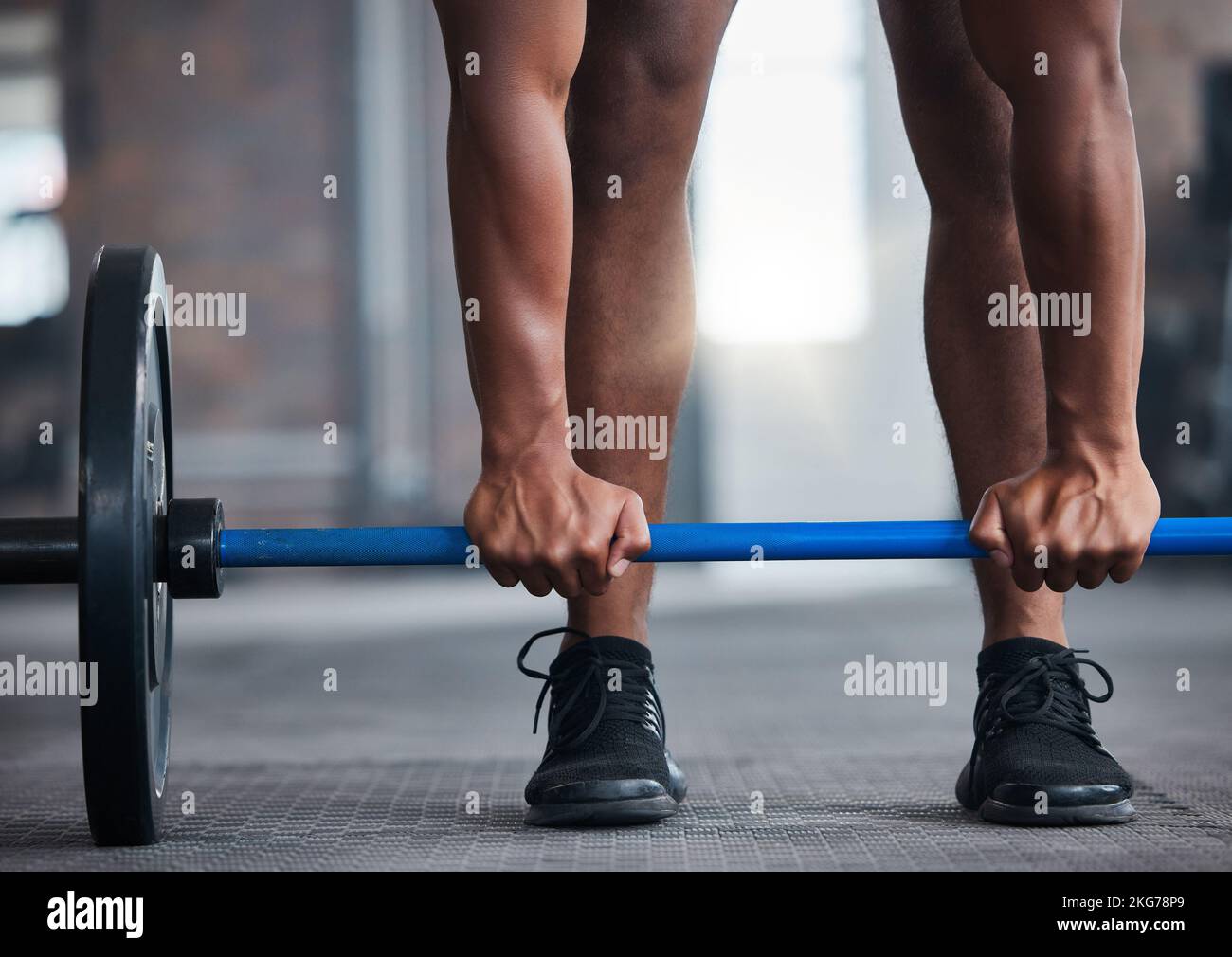 Barbell, fitness and strong man hands or bodybuilder in gym for muscle wellness, training challenge and workout. Sports, energy and power of an Stock Photo