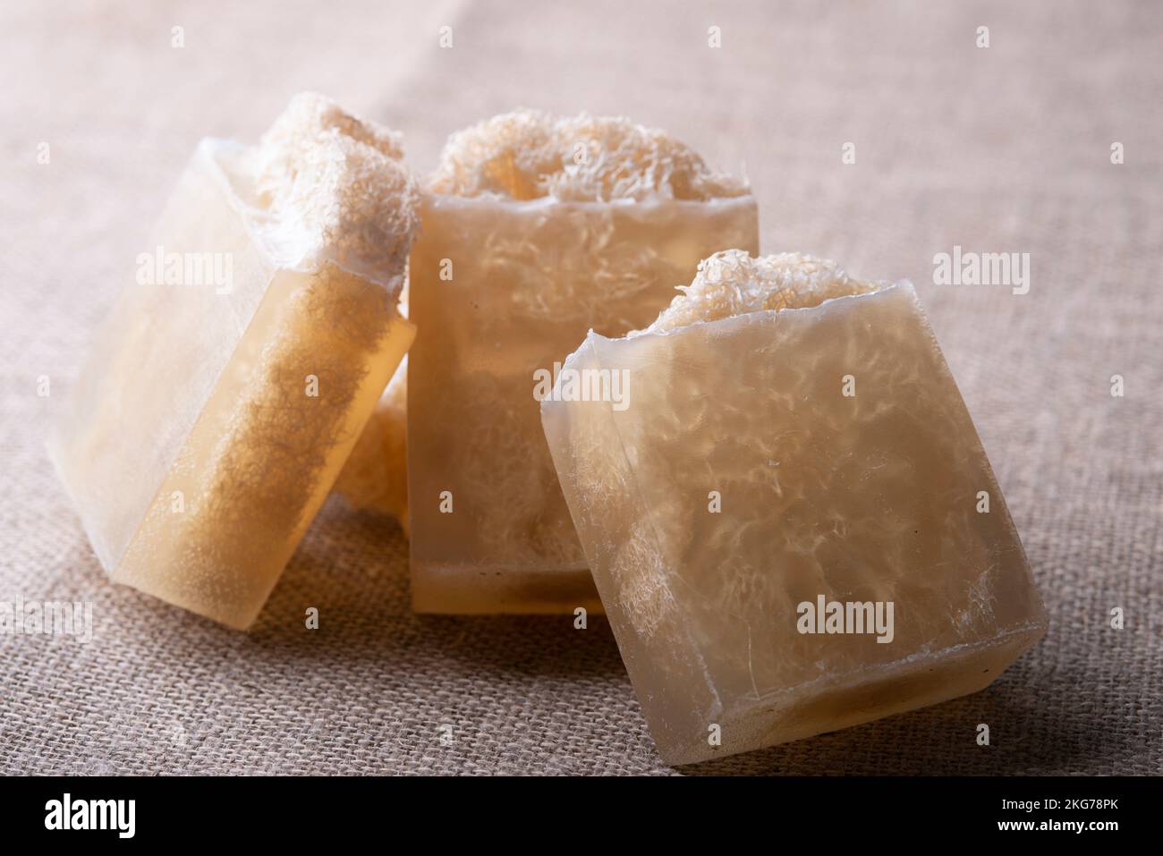 Soap with loofah sponge inside. Glycerin soaps with natural scrub Stock