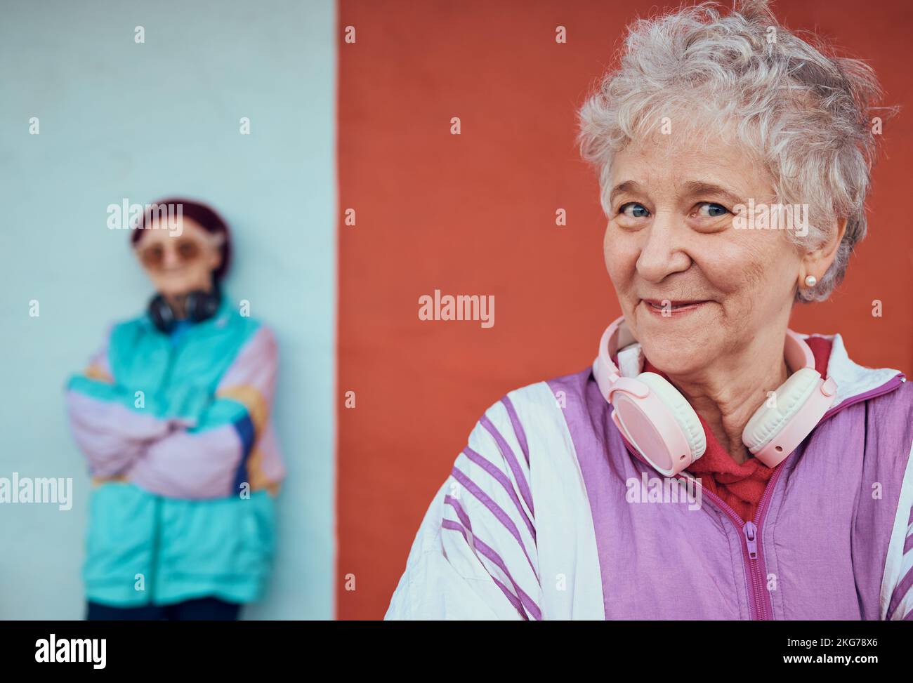 Music, hip hop and senior women with street style, urban smile and 5g headphones in the city. Pride, happy and face portrait of an elderly lady in Stock Photo