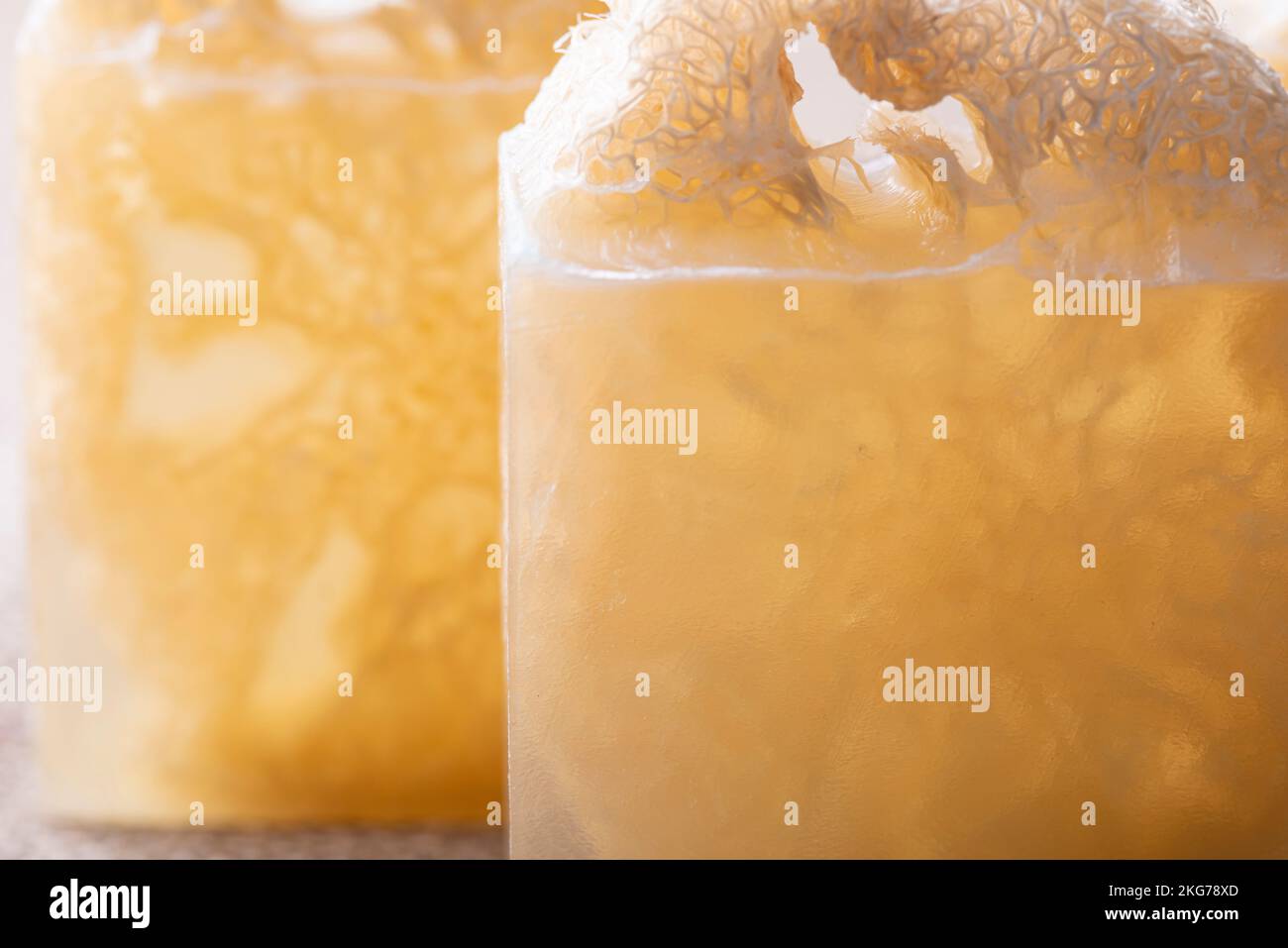 Soap with loofah sponge inside. Glycerin soaps with natural scrub Stock