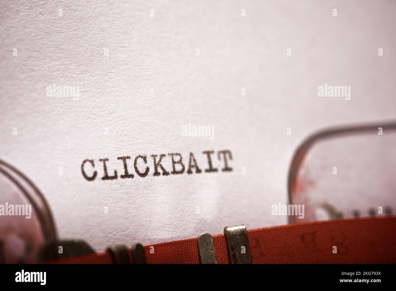 Clickbait word written with a typewriter. Stock Photo