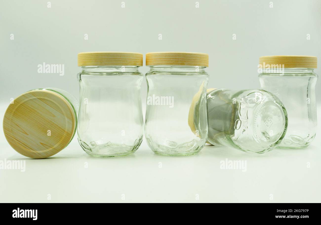 glass jars with wooden lids for healthy foods Stock Photo Alamy
