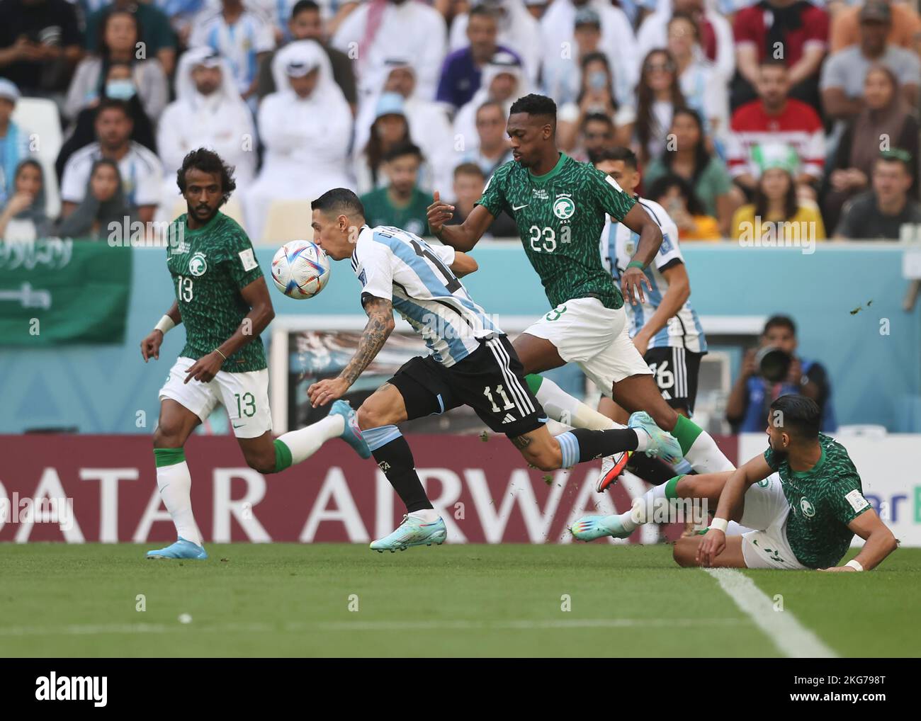 Lusail Iconic Stadium, Lusail, Qatar. 22nd Nov, 2022. FIFA World Cup Football, Argentina versus Saudi Arabia; Angel Di Maria of Argentina challenged by Mohamed Kanno of Saudi Arabia Credit: Action Plus Sports/Alamy Live News Stock Photo