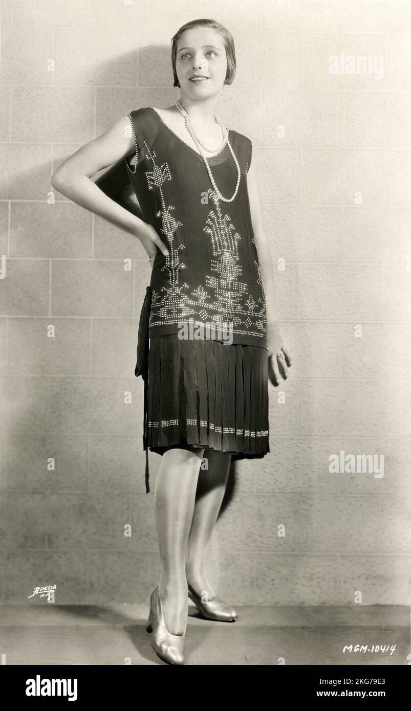 Portrait of Mona Mårtenson (1902 - 1956) - Swedish motion pictures star hired by MGM in a  pearl black chiffon dinner dress of parisian fashion designer Patou Stock Photo