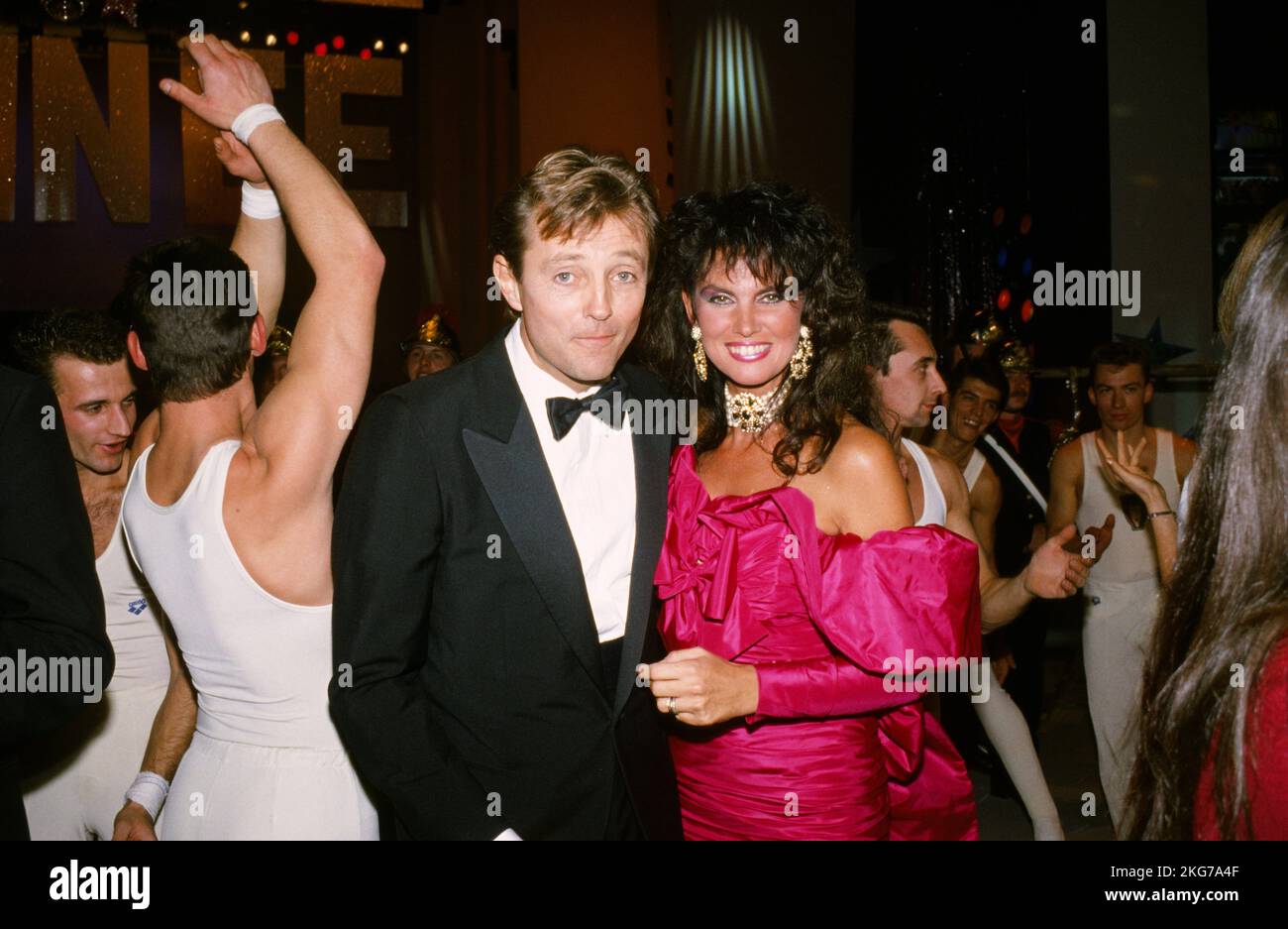 Chris Mitchum and Caroline Munro in the backstages of the TV show 'Lahaye d'honneur' on TF1 on 1 January 1988 Stock Photo