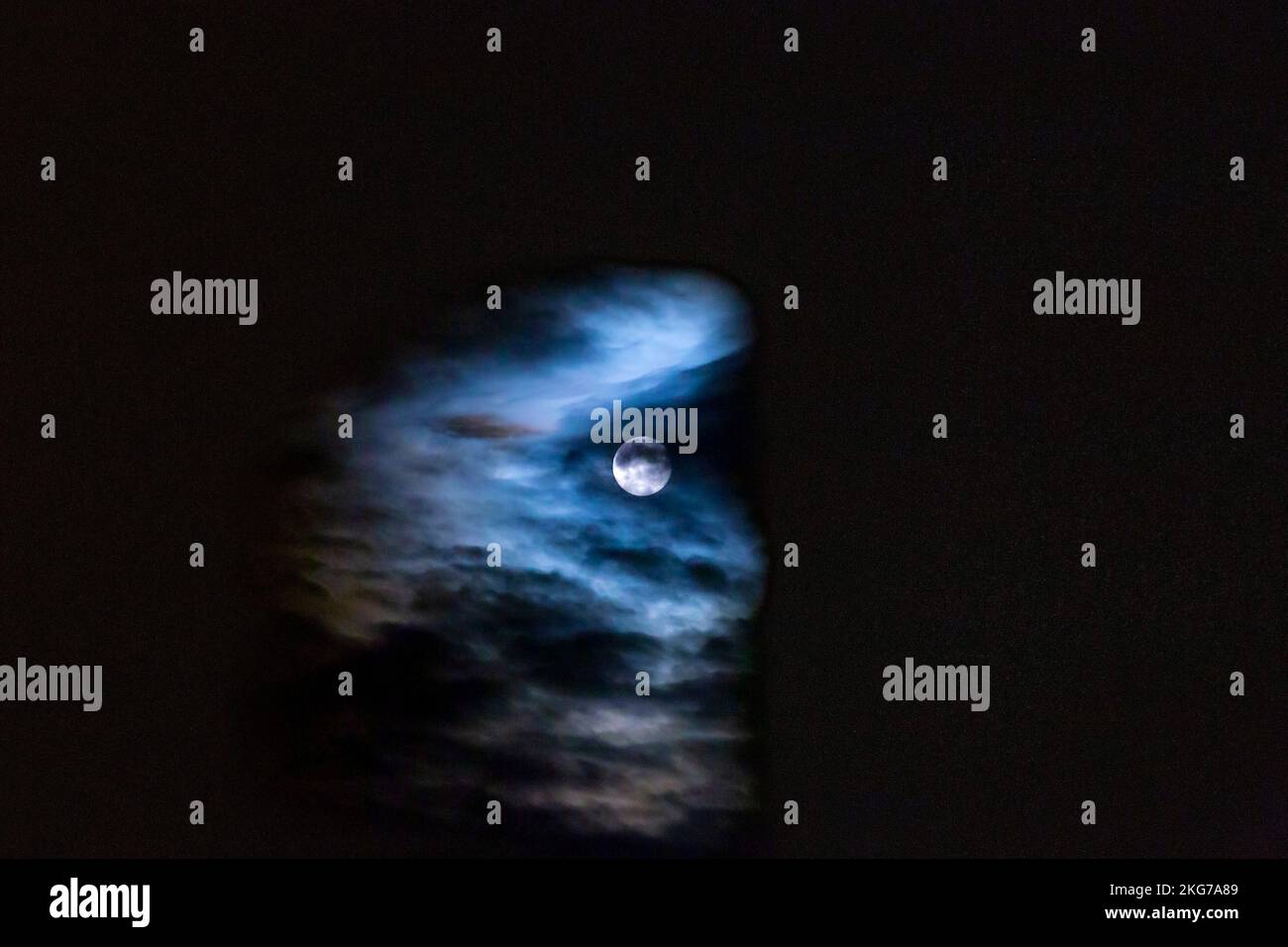 Full moon night behind clouds hi-res stock photography and images - Alamy
