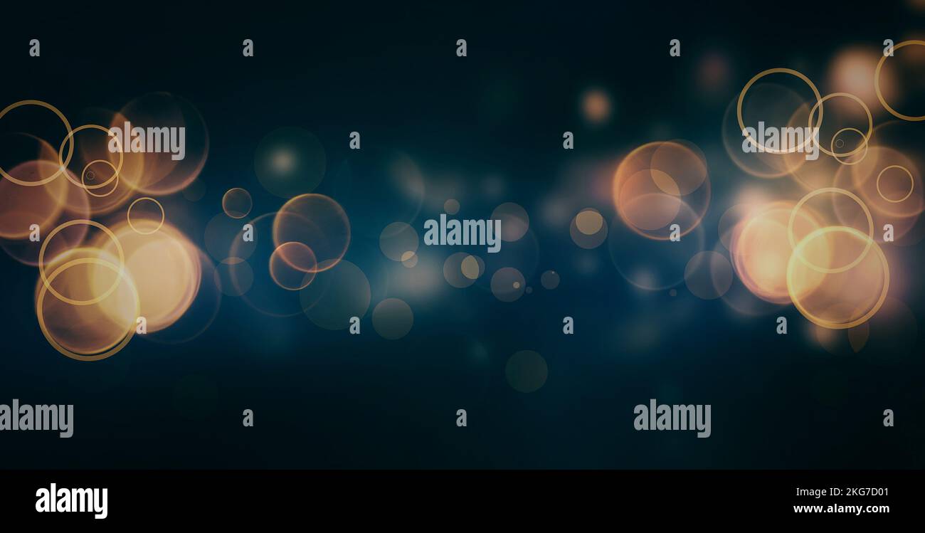 Golden bokeh lights on a blue light background Stock Photo - Alamy