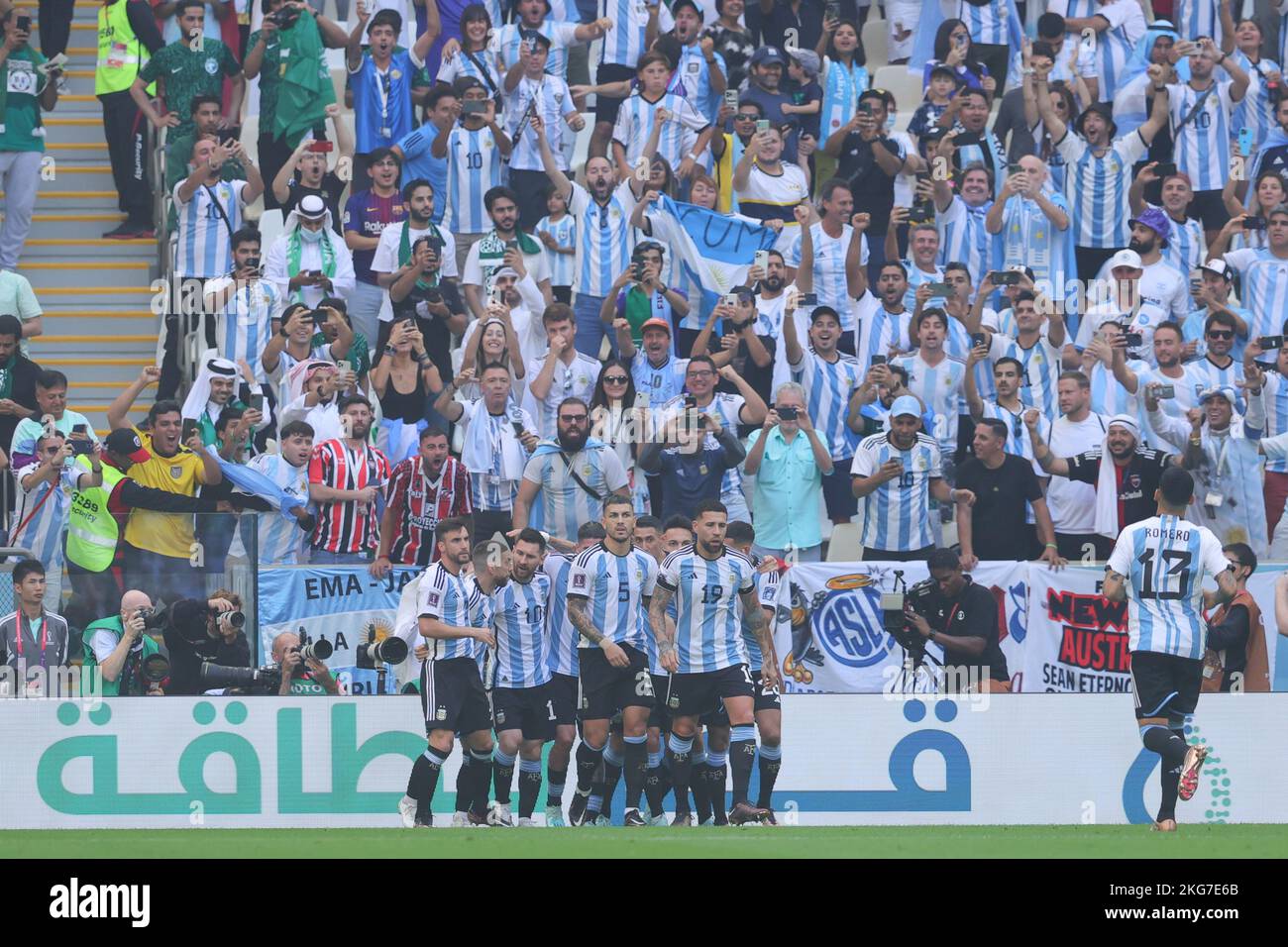 Lusail, Qatar. 22nd Nov, 2022. Lionel Messi of Argentina scores from the penalty spot and celebrates with team mates during the FIFA World Cup Qatar 2022 Group C match between Argentina and Saudi Arabia at Lusail Stadium, Lusail, Qatar on 22 November 2022. Photo by Peter Dovgan. Editorial use only, license required for commercial use. No use in betting, games or a single club/league/player publications. Credit: UK Sports Pics Ltd/Alamy Live News Stock Photo