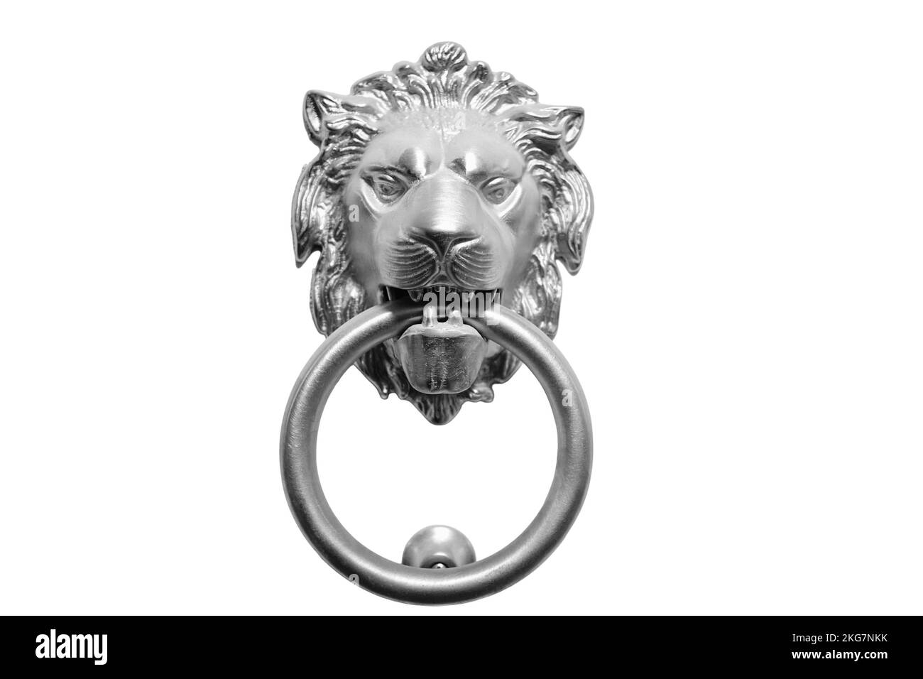 Head of a lion in silver color for knocking on a white door, isolated on a white background. Knocker in the form of a muzzle of a lion with a ring, cl Stock Photo