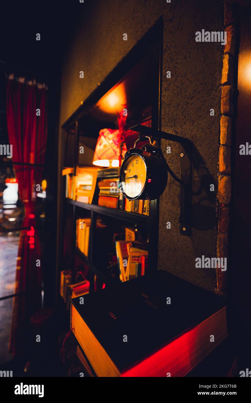 Restaurant interior and ornamental clock Stock Photo Alamy