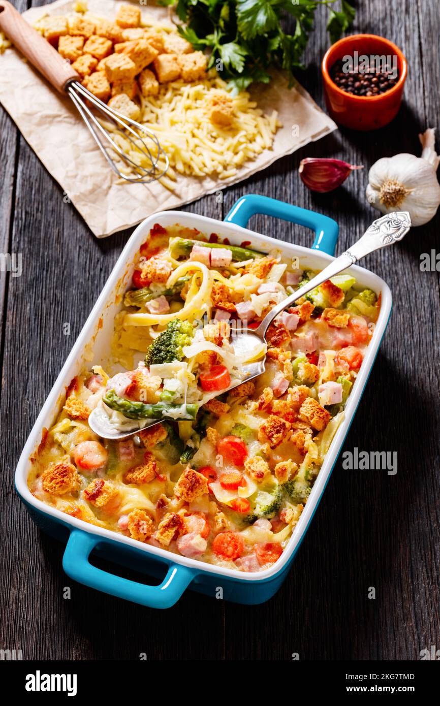 Ham and Noodle Casserole with egg noodles, chopped ham, carrots