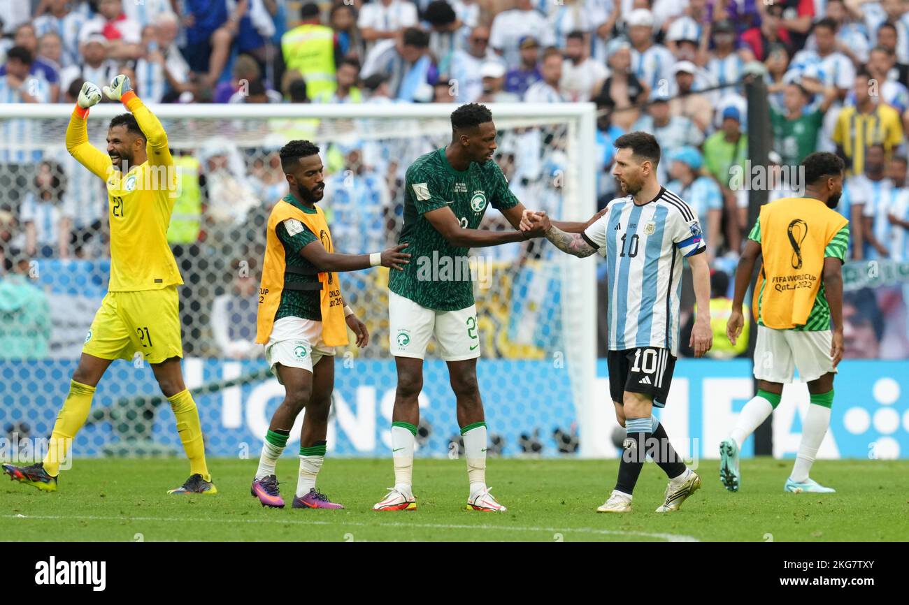 Argentina's Lionel Messi (right) and Saudi Arabia's Mohamed Kanno after the FIFA World Cup Group C match at Lusail Stadium, Lusail, Qatar. Picture date: Tuesday November 22, 2022. Stock Photo