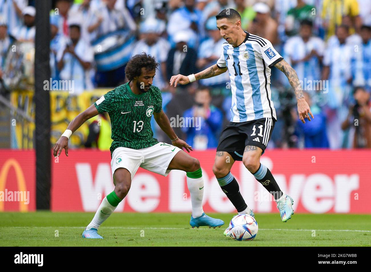 Lusail City, Qatar. 22nd Nov, 2022. LUSAIL CITY, QATAR - NOVEMBER 22: Yassel Alshahrani of Saudi Arabia battles for the ball with Angel Di Maria of Argentinia during the Group C - FIFA World Cup Qatar 2022 match between Argentina and Saudi Arabia at the Lusail Stadium on November 22, 2022 in Lusail City, Qatar (Photo by Pablo Morano/BSR Agency) Credit: BSR Agency/Alamy Live News Stock Photo