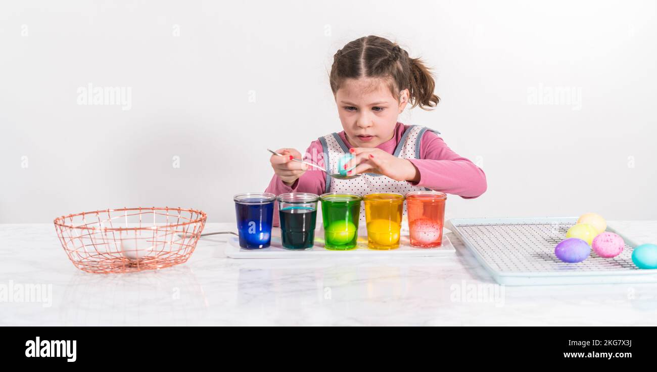 Easter egg coloring Stock Photo - Alamy