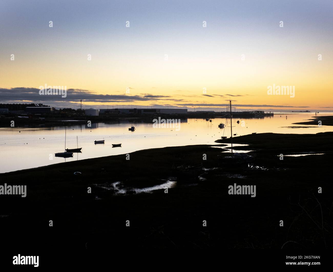 Looking towards Piel Castle and island from the Walney channel at sunrise, Barrow in Fuirness, Cumbria, UK. Stock Photo