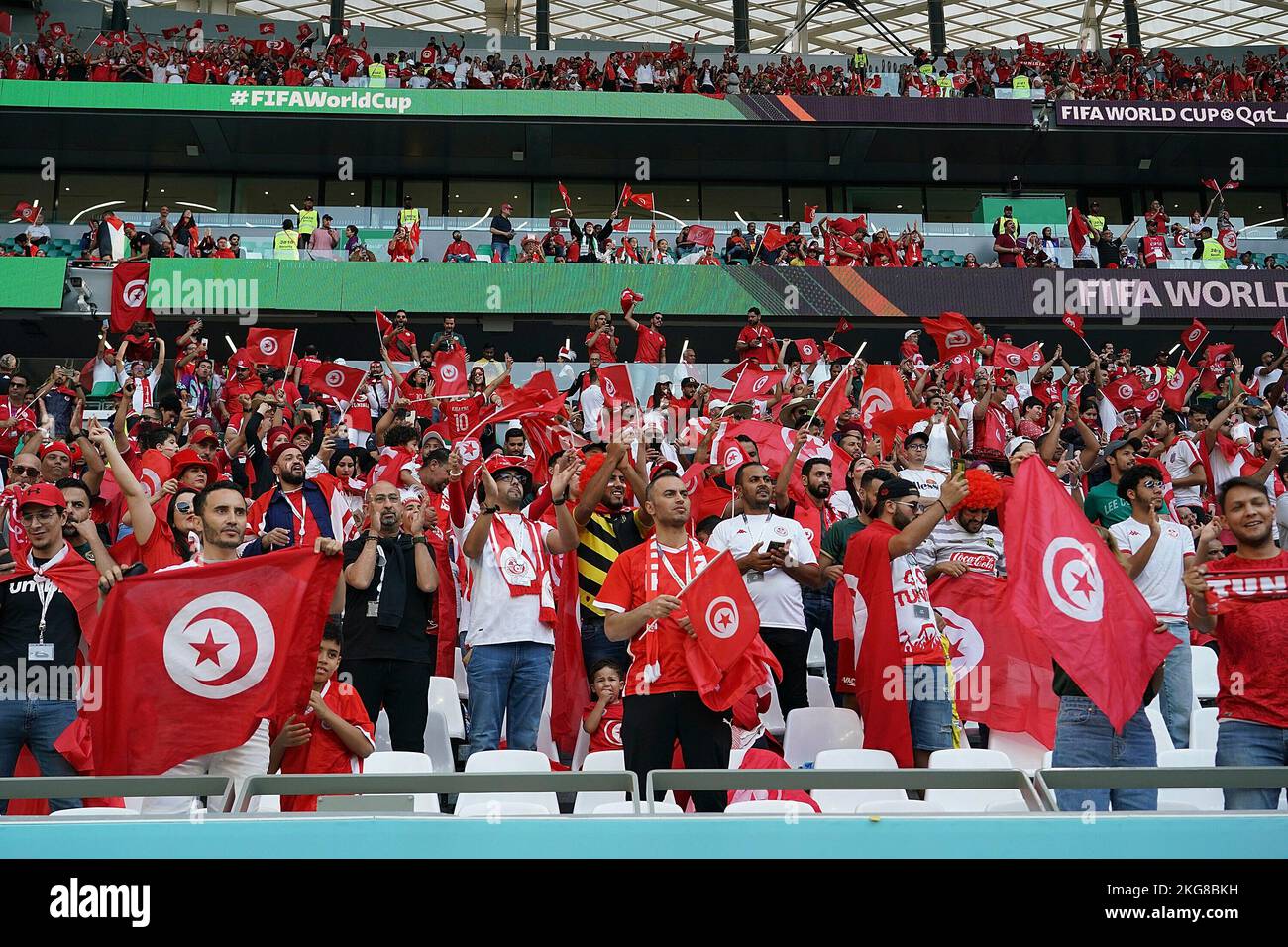 Doha, Qatar. 11/22/2022, Education City Stadium, Doha, QAT, World Cup FIFA 2022, Group D, Denmark vs Tunisia, in the picture Tunisian fans celebrate in the stands. Credit: dpa picture alliance/Alamy Live News Stock Photo
