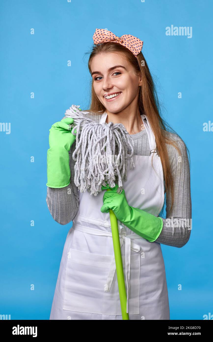 woman in rubber gloves and cleaner apron holding mop Stock Photo - Alamy