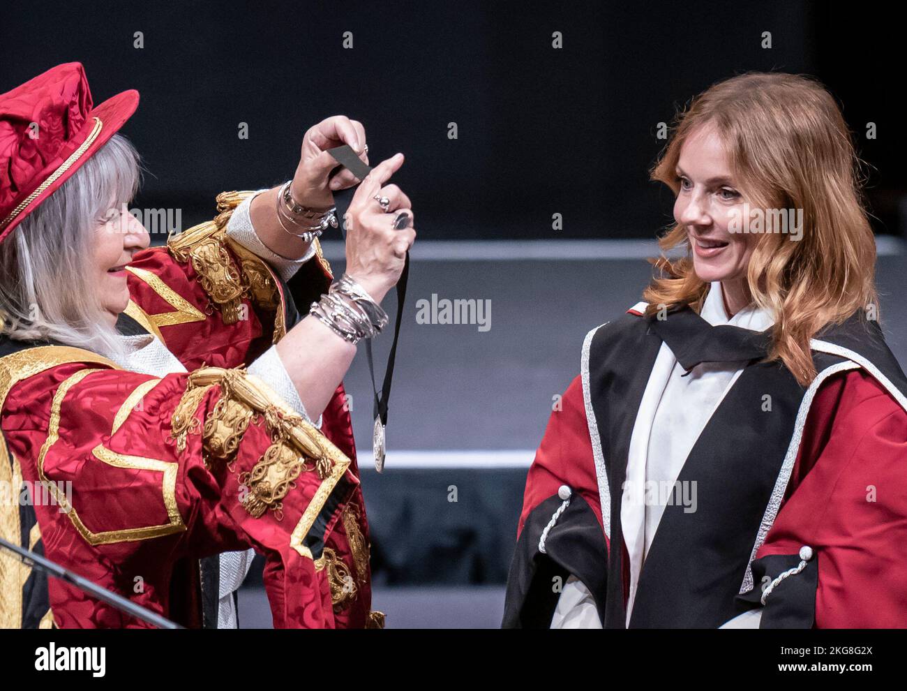 Chancellor of Sheffield Hallam University Baroness Helena Kennedy (left) presents Geri Halliwell-Horner (right) with an honorary doctorate from Sheffield Hallam University at Ponds Forge International Sports Centre in Sheffield. Picture date: Tuesday November 22, 2022. Stock Photo