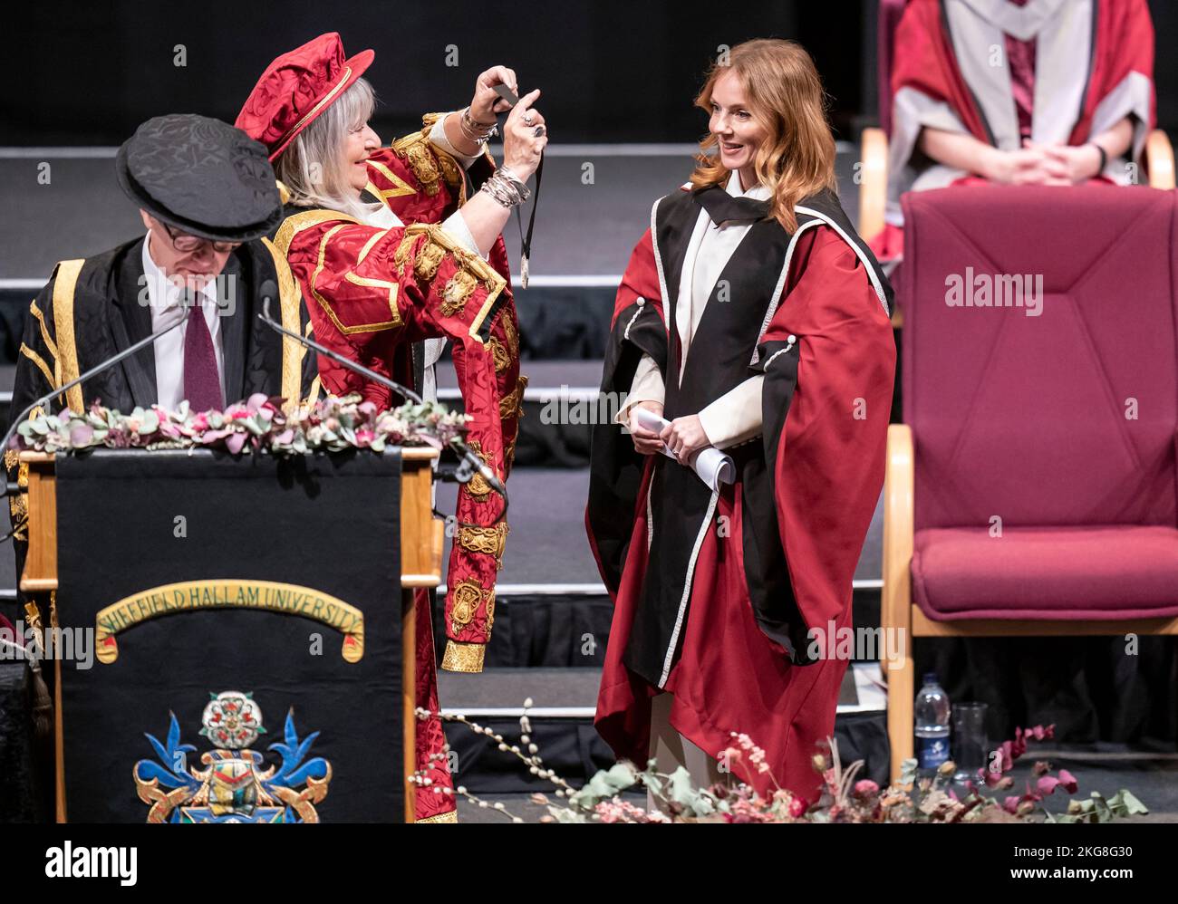 Chancellor of Sheffield Hallam University Baroness Helena Kennedy (second left) presents Geri Halliwell-Horner (right) with an honorary doctorate from Sheffield Hallam University at Ponds Forge International Sports Centre in Sheffield. Picture date: Tuesday November 22, 2022. Stock Photo