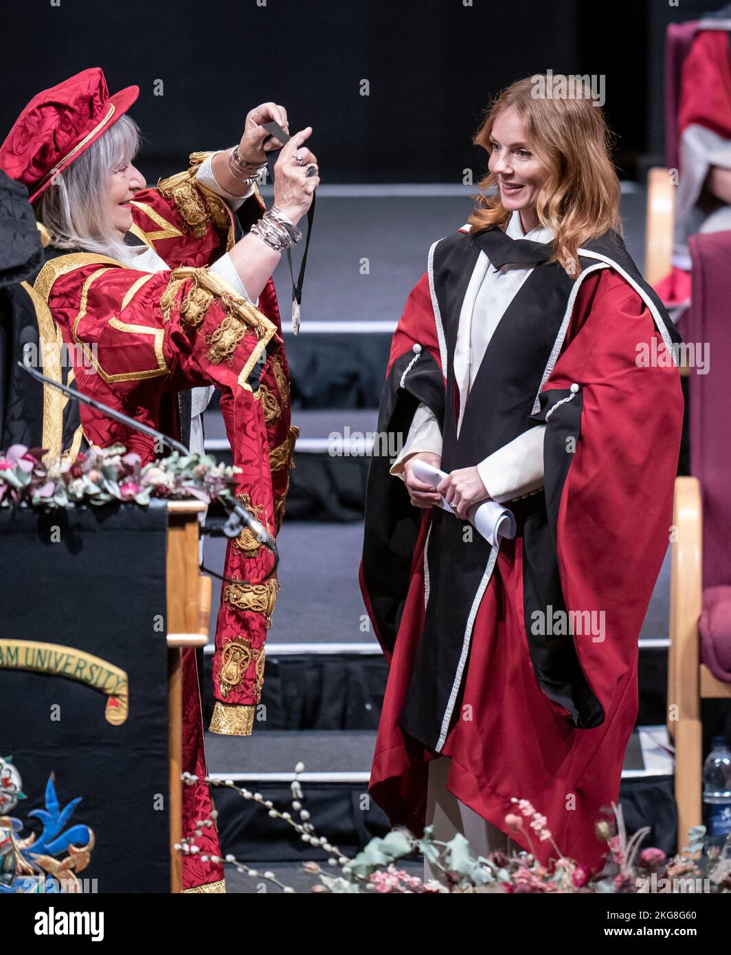 Chancellor of Sheffield Hallam University Baroness Helena Kennedy (left) presents Geri Halliwell-Horner (right) with an honorary doctorate from Sheffield Hallam University at Ponds Forge International Sports Centre in Sheffield. Picture date: Tuesday November 22, 2022. Stock Photo