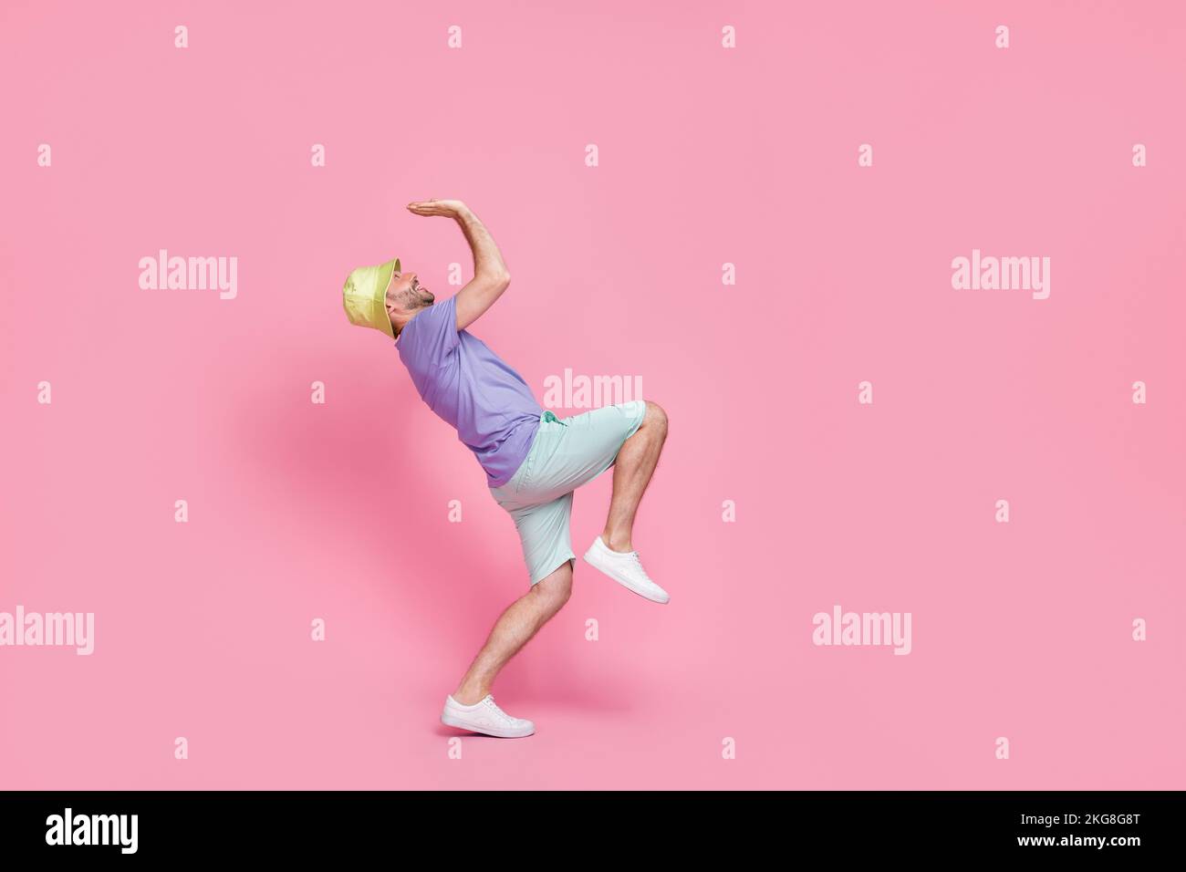 Full body photo of nice young guy holding lifting heavy empty space ...