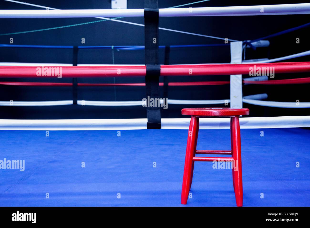 Red stool in boxing ring Stock Photo