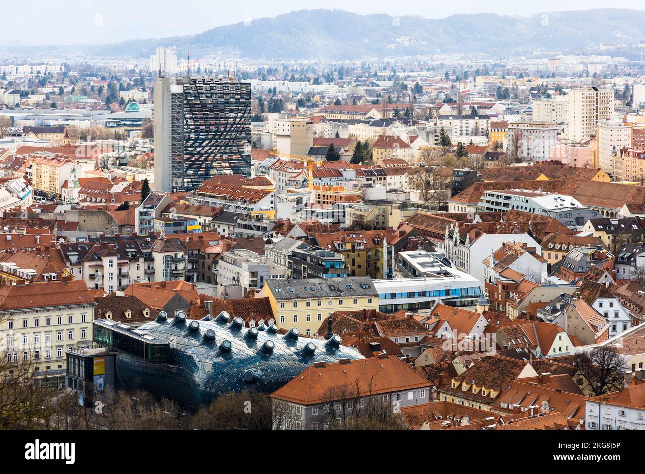View of Graz with Kunsthaus, riverside contemporary art museum, and A1 Tower at the background. Graz, Styria, Austria. Stock Photo