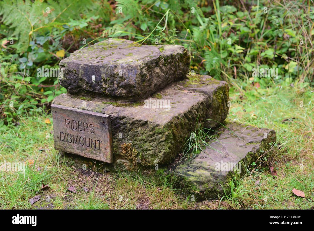 A horse mounting block constructed of local stone slabs. Stock Photo