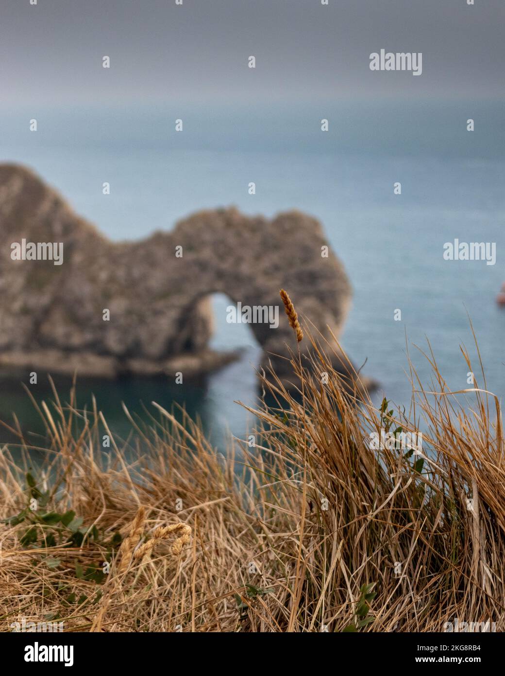 Durdle Door under an overcast sky on the south coast of the uk showing the English Channel. Stock Photo