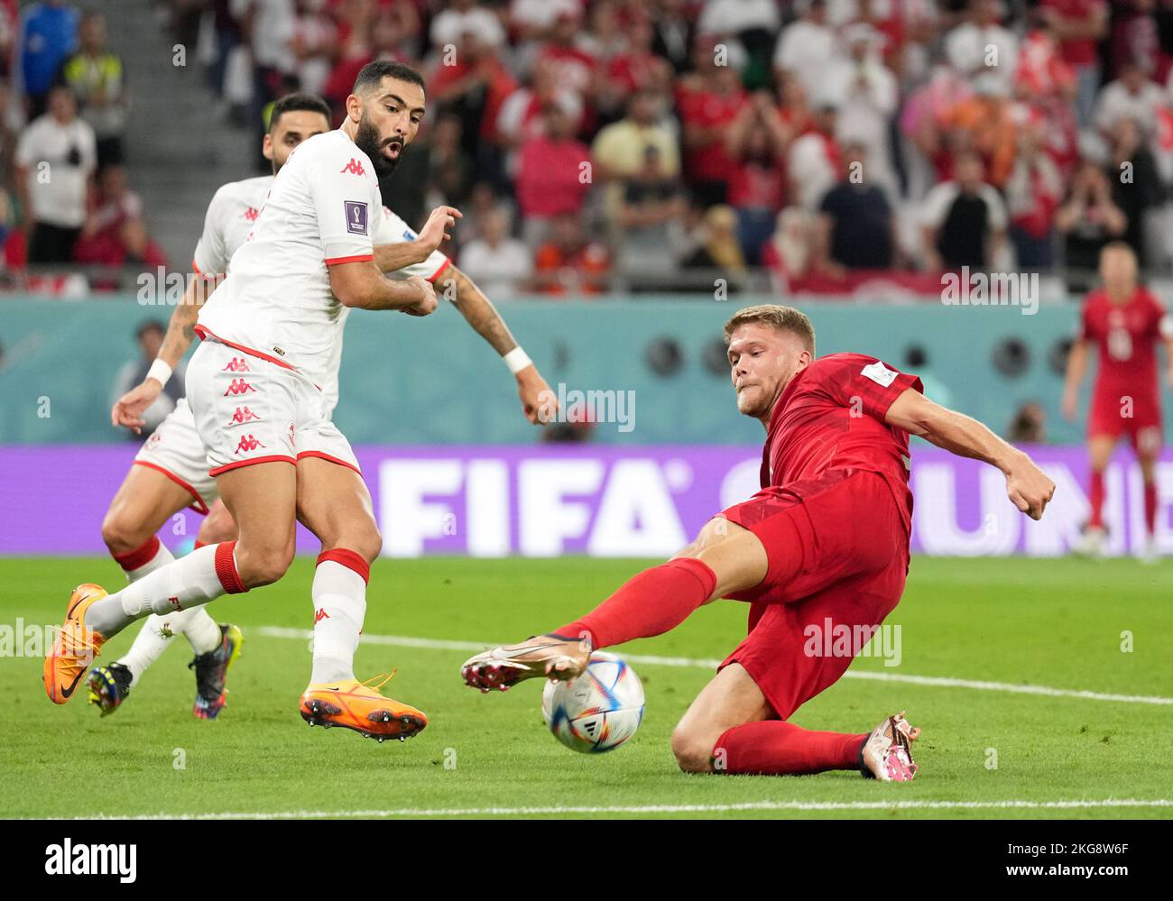 Al Rayyan, Qatar. 22nd Nov, 2022. Andreas Cornelius (R) of Denmark vies with Yassine Meriah of Tunisia during the Group D match between Denmark and Tunisia at the 2022 FIFA World Cup at Education City Stadium in Al Rayyan, Qatar, Nov. 22, 2022. Credit: Zheng Huansong/Xinhua/Alamy Live News Stock Photo