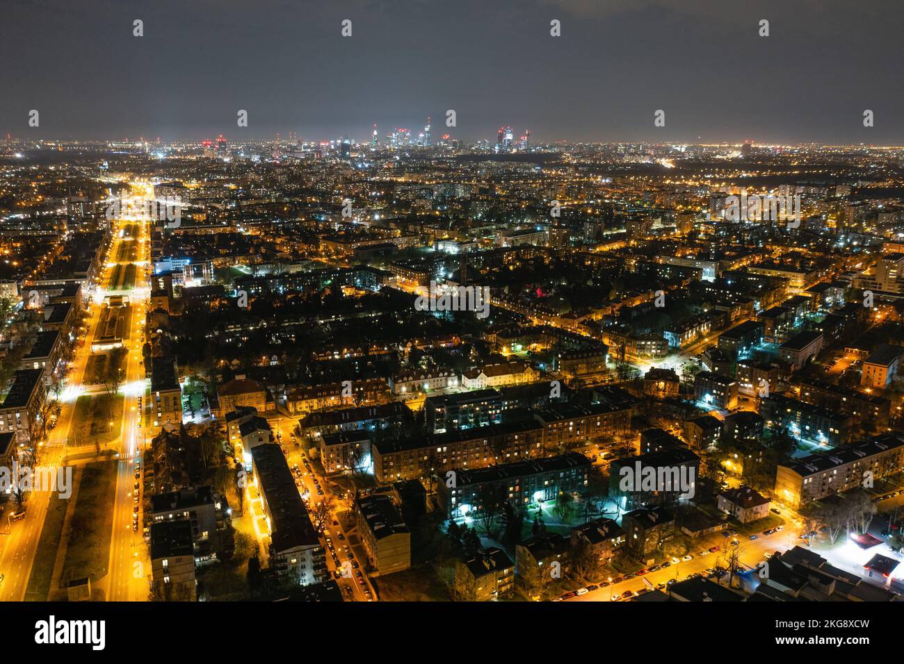 Warsaw by night, aerial landscape of illuminated streets and buildings Stock Photo