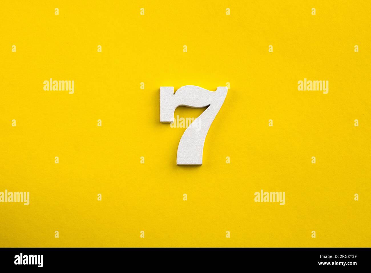 Number 7 White wooden number on yellow background Stock Photo Alamy Number 7 White wooden number on yellow background Stock Photo Alamy